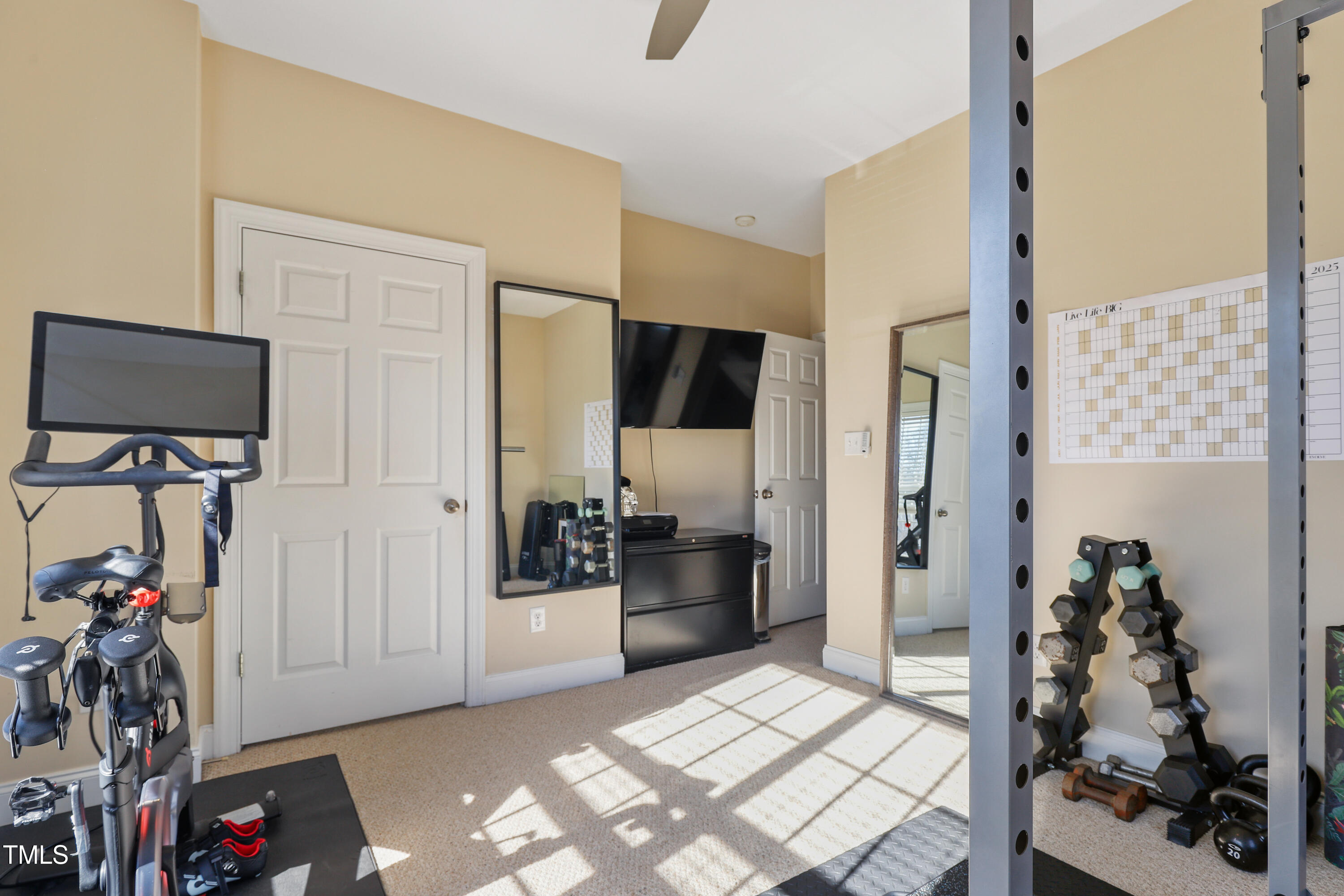 672 Highpark Lane Raleigh, NC 27608 - Photo 21 of 25 a view of livingroom with furniture and flat screen tv