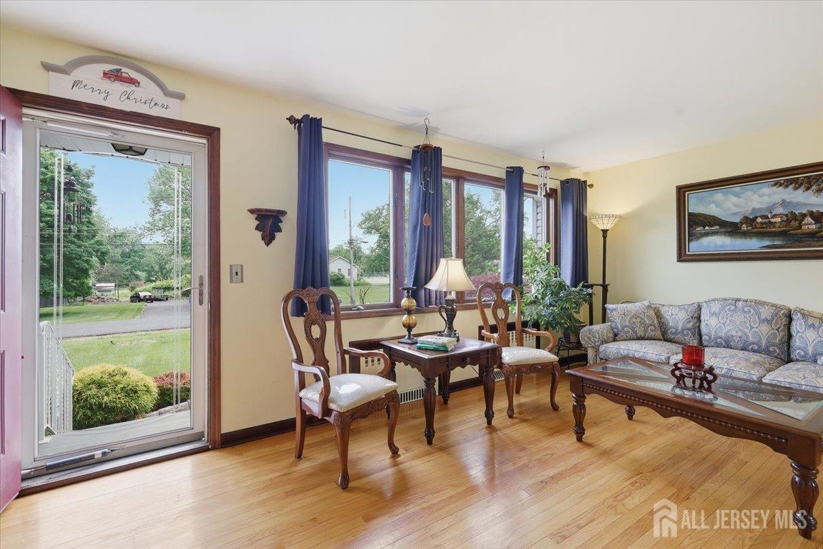 33 Ellison Road Somerset, NJ 08873 - Photo 4 of 38 a living room with furniture and a window