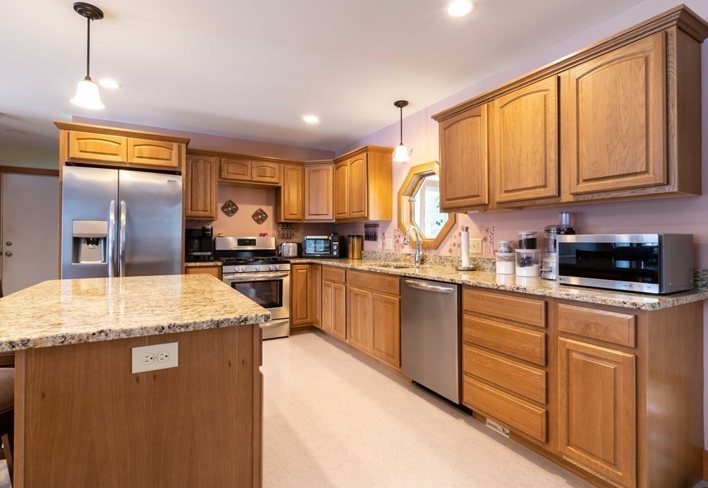 261 Old Chesterfield Road Chesterfield, MA 01096 - Photo 13 of 37 a kitchen with granite countertop a sink stainless steel appliances and cabinets