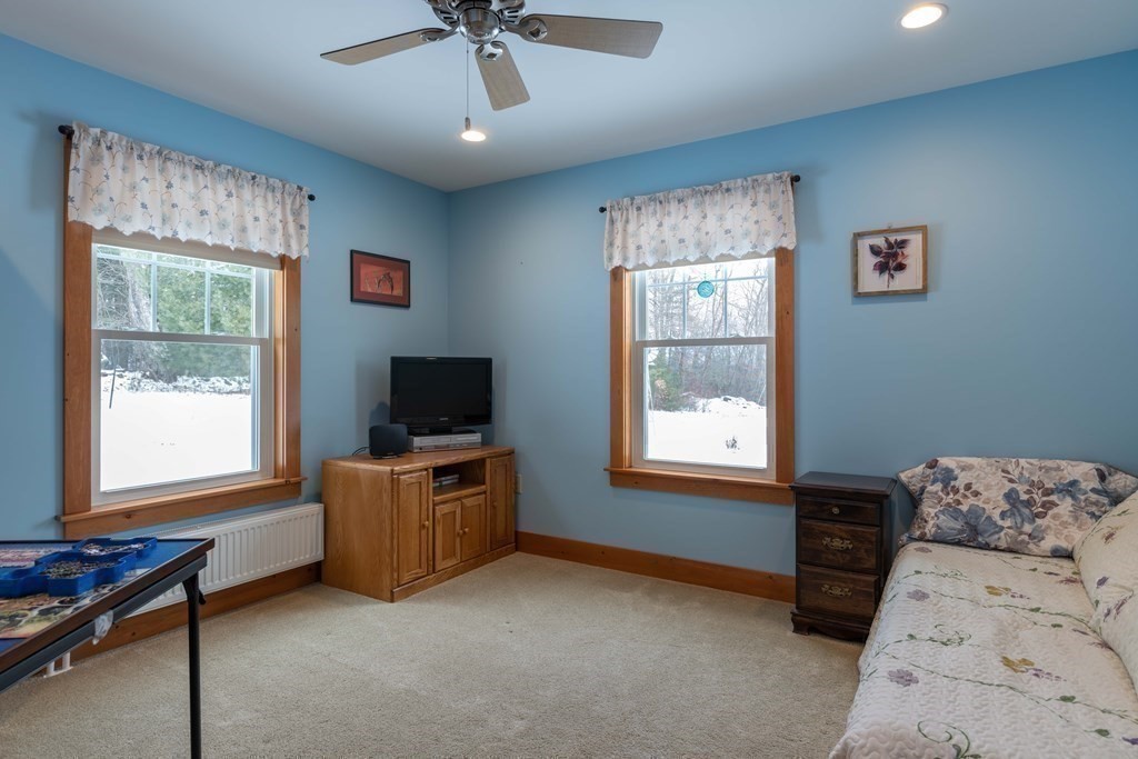 261 Old Chesterfield Road Chesterfield, MA 01096 - Photo 20 of 37 a living room with furniture and a window