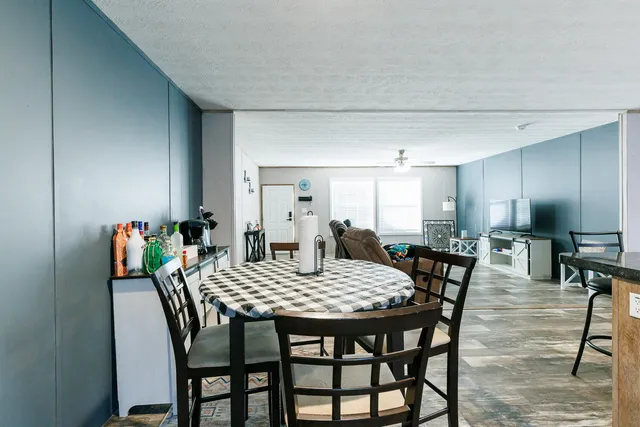 a view of a balcony with two chairs