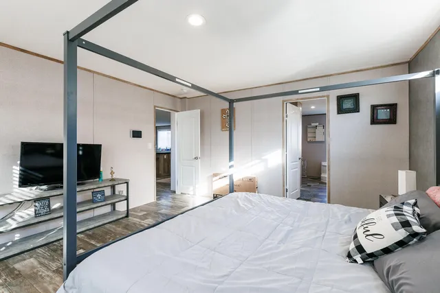 a bathroom with a shower and a toilet