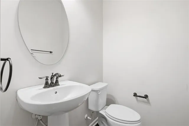 a bathroom with a tub and a shower