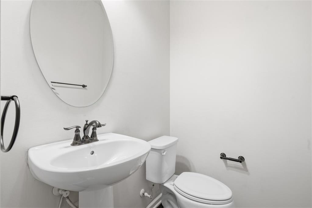 1204 Pointe View Drive Mars, PA 16046 - Photo 15 of 37 a bathroom with a sink a toilet and mirror