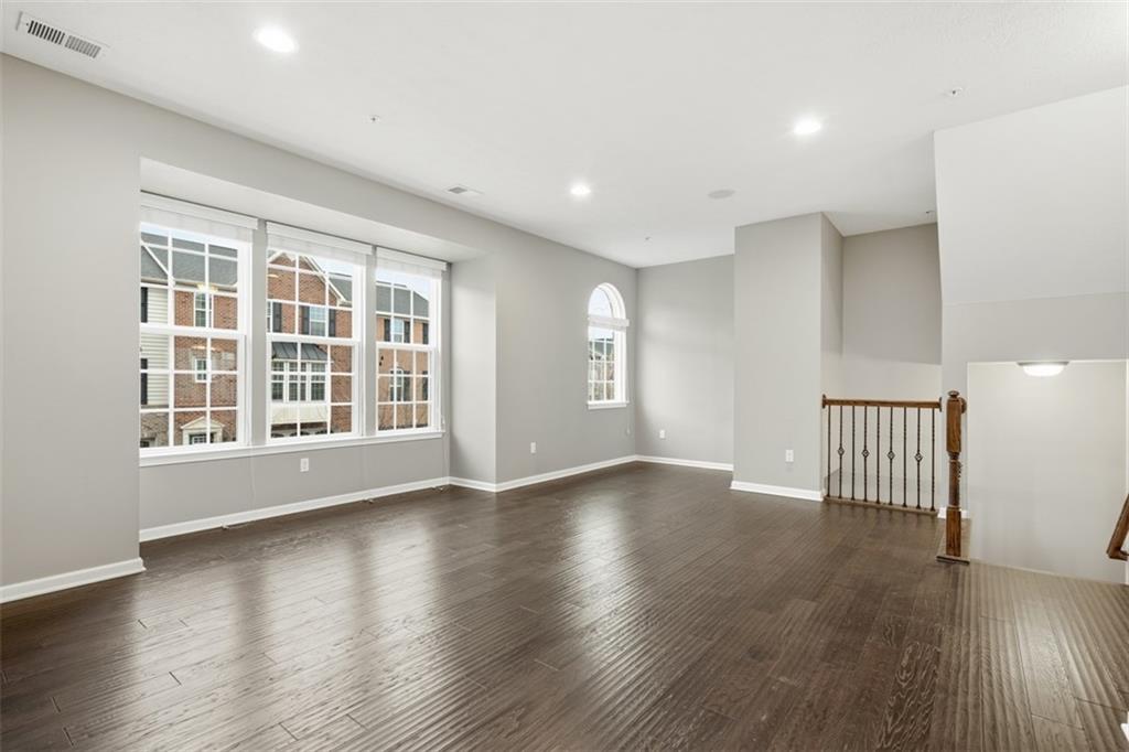 1204 Pointe View Drive Mars, PA 16046 - Photo 4 of 37 a view of an empty room with wooden floor and a window