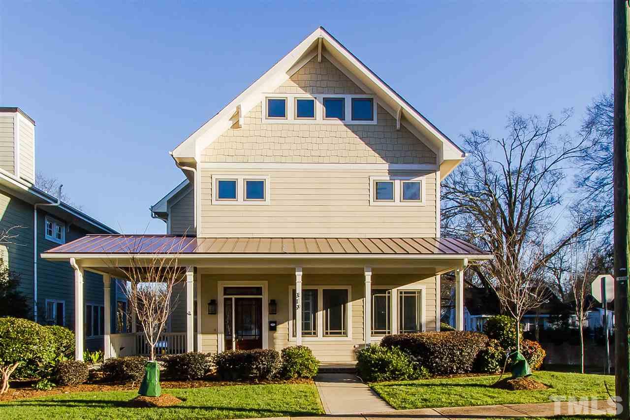 319 Perry Street Raleigh, NC 27608 - Photo 1 of 25 front view of residential houses with yard