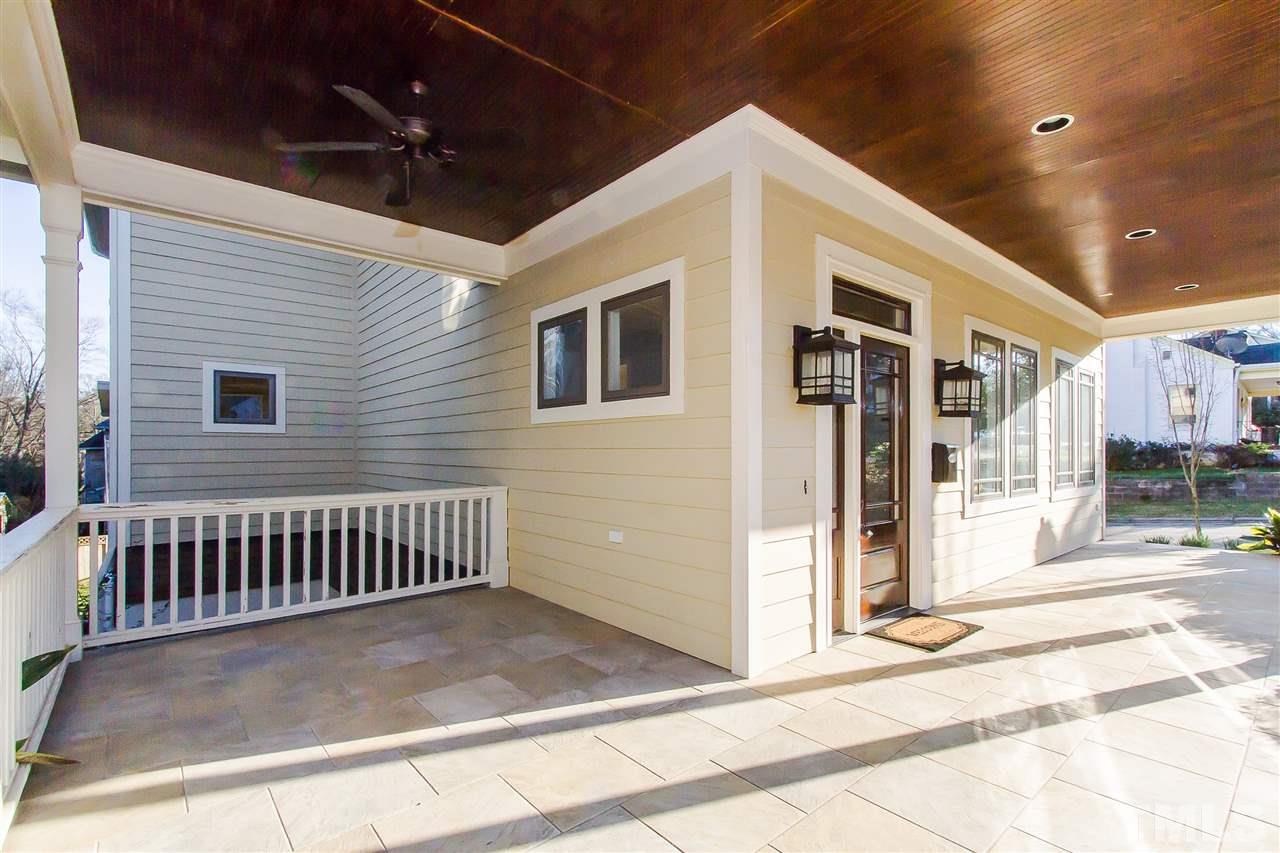 319 Perry Street Raleigh, NC 27608 - Photo 2 of 25 a view of a house with a park