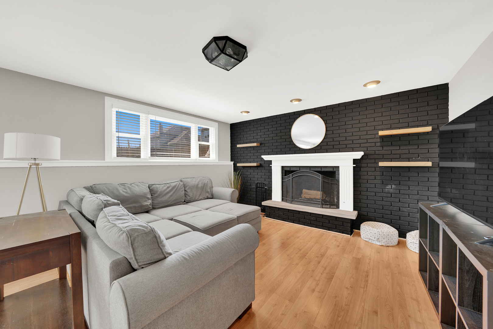 9737 West 57th Street Countryside, IL 60525 - Photo 12 of 19 a living room with furniture and a fireplace