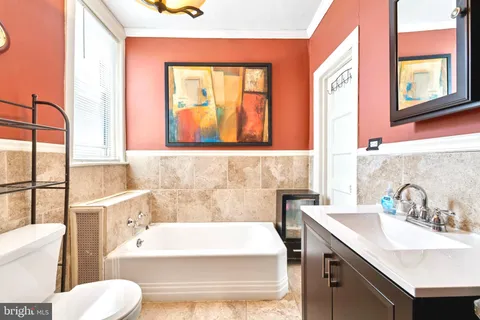 a bathroom with a sink and a bathtub