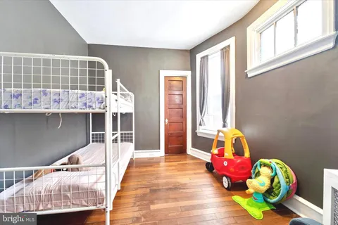a living room filled with furniture and a table