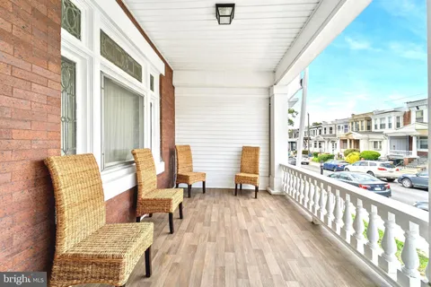 a view of balcony with furniture