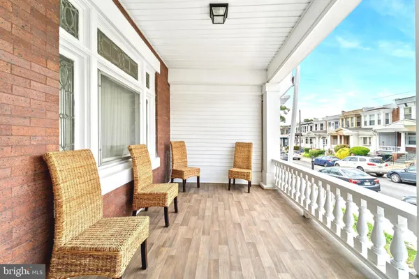 a view of balcony with furniture