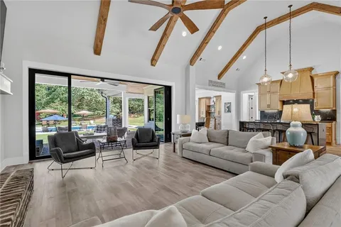 a view of a livingroom with furniture and window