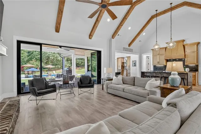 a view of a livingroom with furniture and window