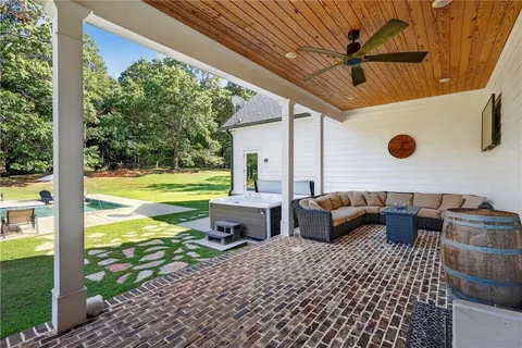 a kitchen with sink stove and cabinets