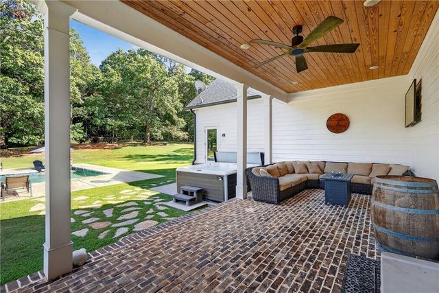 a kitchen with sink stove and cabinets