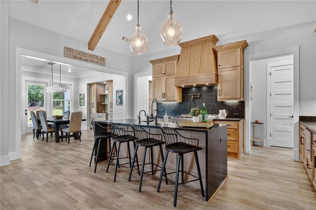 4621 Stanley Road Flowery Branch, GA 30542 - Photo 19 of 65 a view of a dining room with furniture