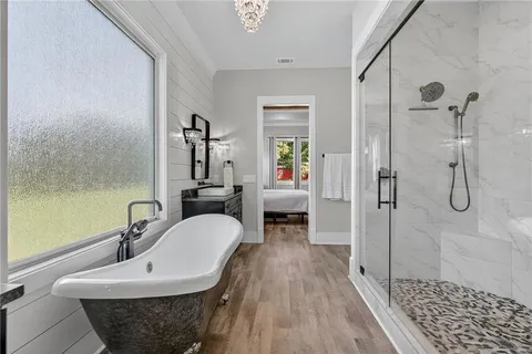 a bedroom with a bed and a walk in closet