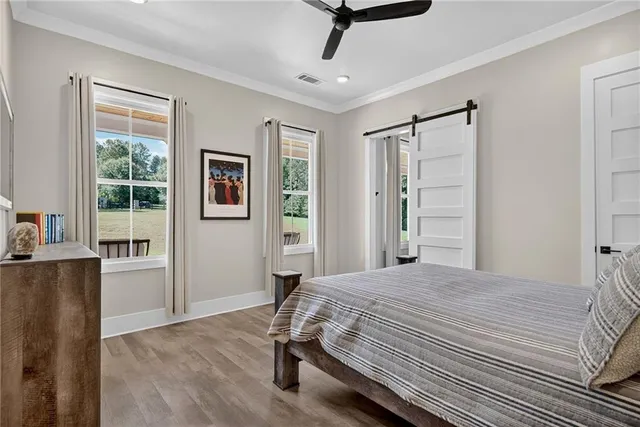 a kitchen with granite countertop stainless steel appliances and refrigerator