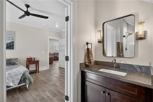 a utility room with sink dryer and washer
