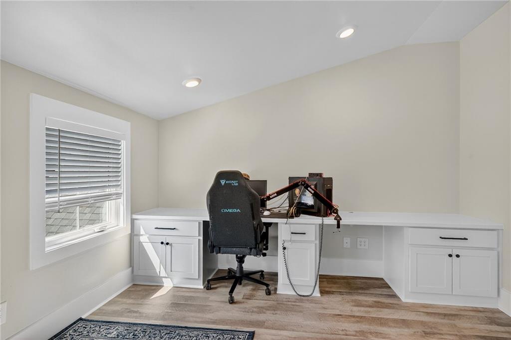 4621 Stanley Road Flowery Branch, GA 30542 - Photo 37 of 65 a view of workspace with wooden floor windows