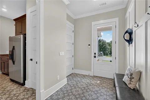 a view of a garage with wooden floor