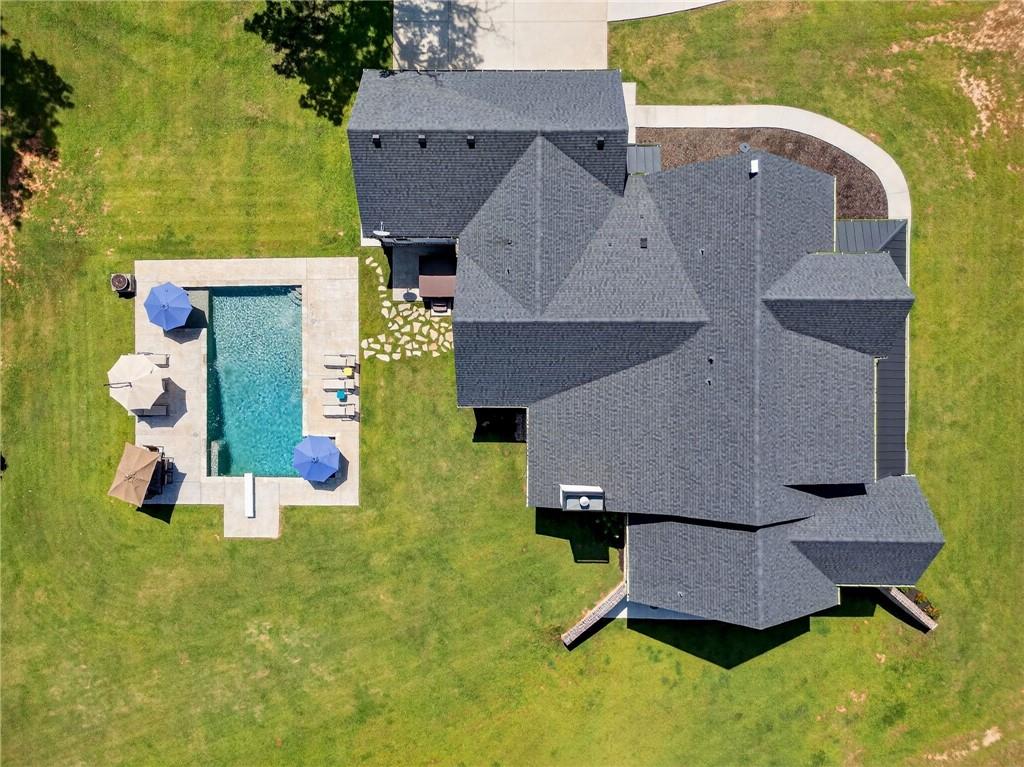 4621 Stanley Road Flowery Branch, GA 30542 - Photo 48 of 65 an aerial view of a house with swimming pool and large tree