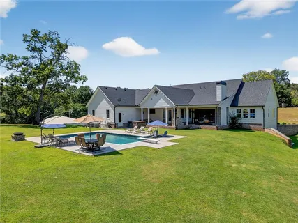 a view of a garden with a lake