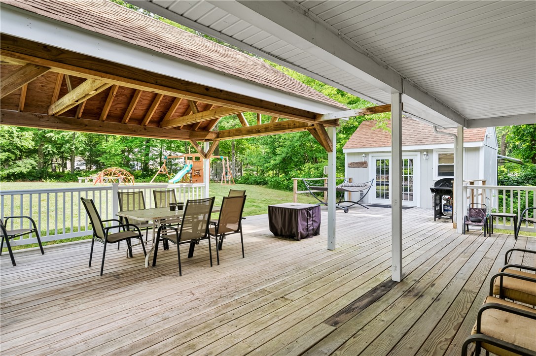 516 Durfee Hill Road Glocester, RI 02814 - Photo 29 of 41 516 Durfee Hill Rd - Covered Deck, Left Side Of House Angle 2
