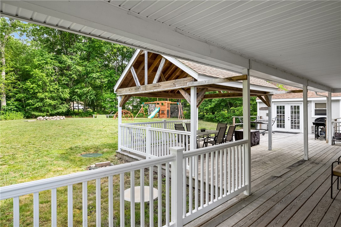 516 Durfee Hill Road Glocester, RI 02814 - Photo 32 of 41 516 Durfee Hill Rd - Covered Deck, Left Side of House Angle 4