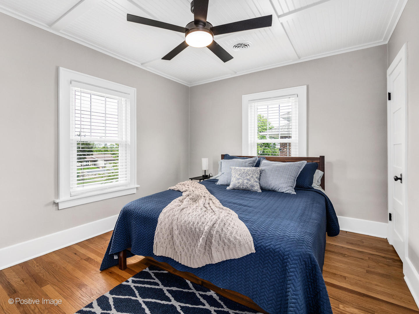 733 South Naperville Road Wheaton, IL 60187 - Photo 23 of 33 a bed sitting in a bedroom next to a window
