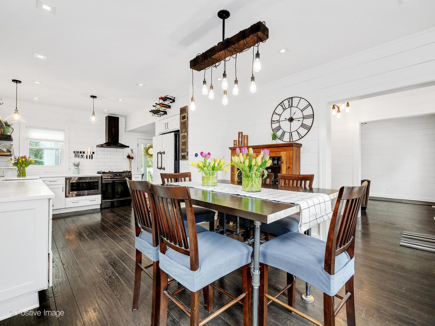 733 South Naperville Road Wheaton, IL 60187 - Photo 8 of 33 a view of a dining room with furniture and wooden floor