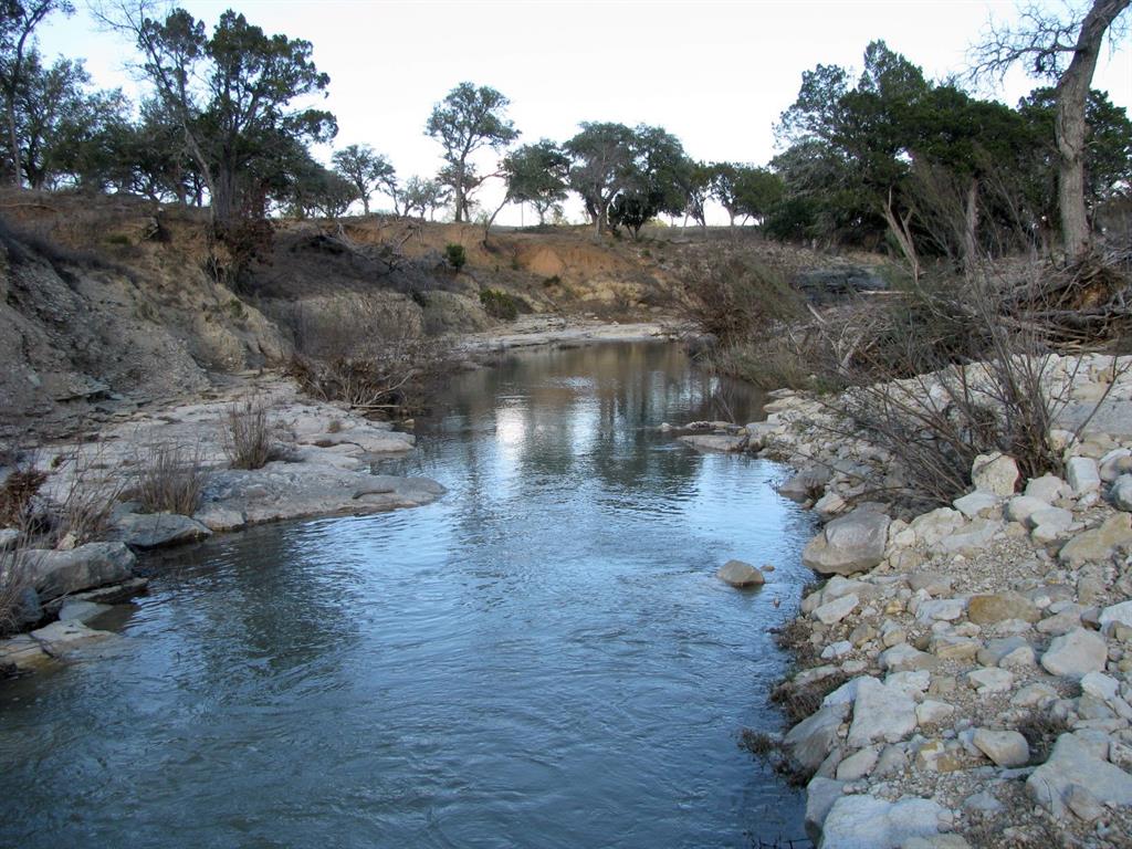 675 Fossil Rdg Court Evant, TX 76525 - Photo 3 of 26 a view of water with a yard