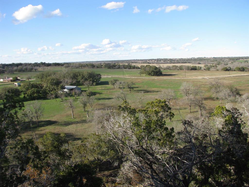 675 Fossil Rdg Court Evant, TX 76525 - Photo 6 of 26 a view of a lake with a city