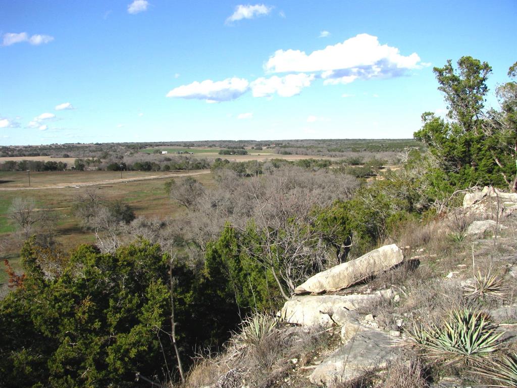 675 Fossil Rdg Court Evant, TX 76525 - Photo 7 of 26 a view of lake and mountain