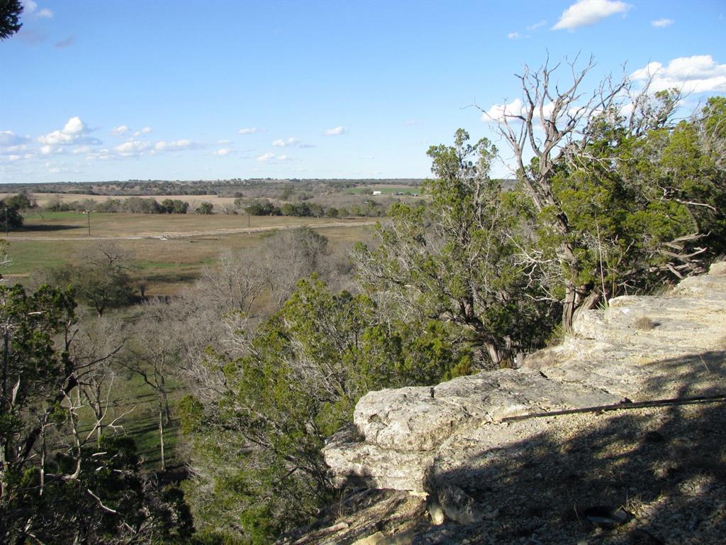 675 Fossil Rdg Court Evant, TX 76525 - Photo 10 of 26 a view of a lake with a mountain