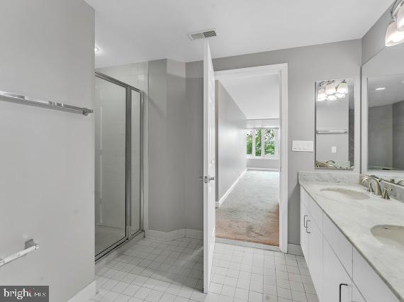 100 Harborview Drive, Unit 202 Baltimore, MD 21230 - Photo 8 of 25 a bathroom with a sink and a mirror