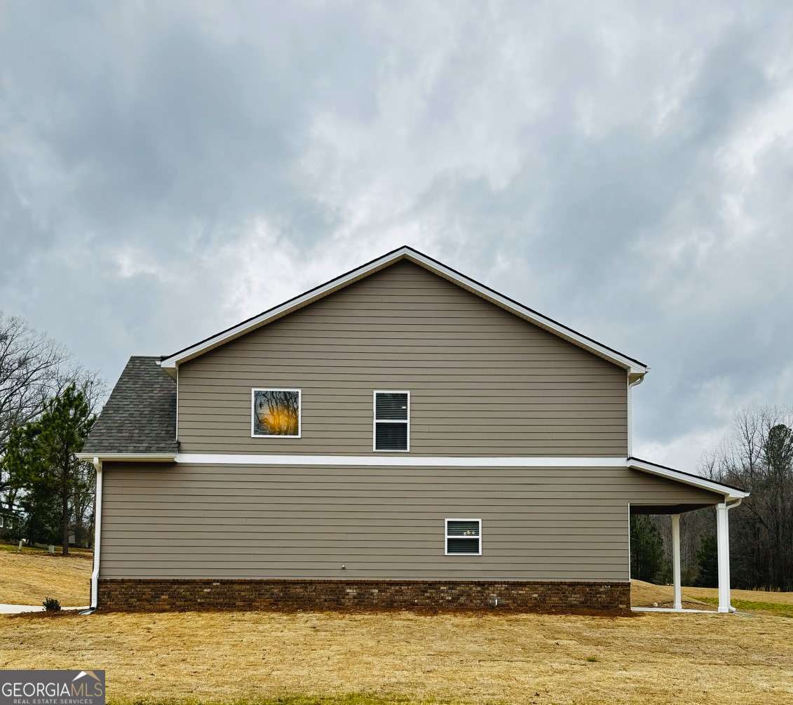 59 Observation Court, Unit 129 Dallas, GA 30132 - Photo 21 of 22 a front view of a house