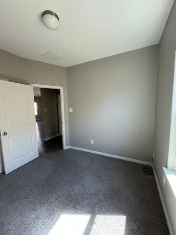 a bathroom with a sink a toilet a mirror and bathtub