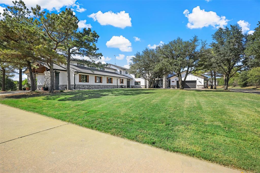 a view of a house with a big yard