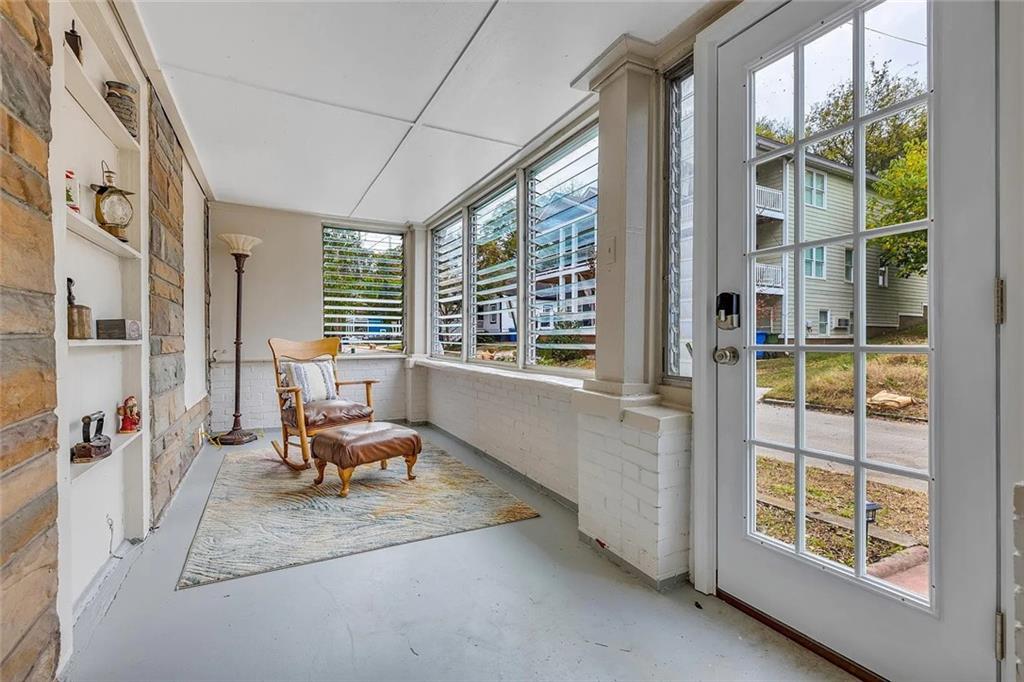 72 Kenyon Street Southeast, Unit 72 Atlanta, GA 30316 - Photo 3 of 10 a living room with furniture and a large window