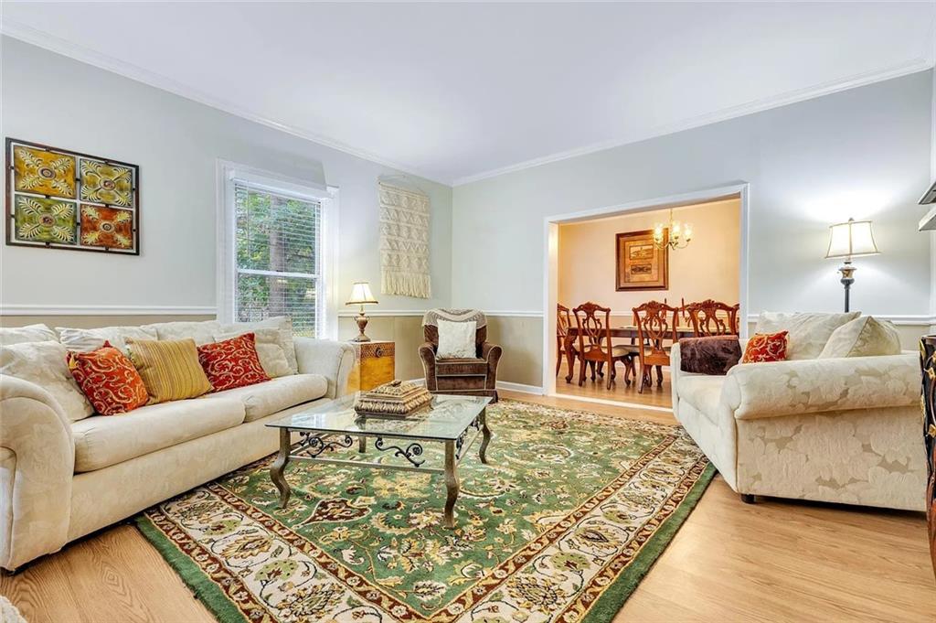 72 Kenyon Street Southeast, Unit 72 Atlanta, GA 30316 - Photo 4 of 10 a living room with furniture and a couch