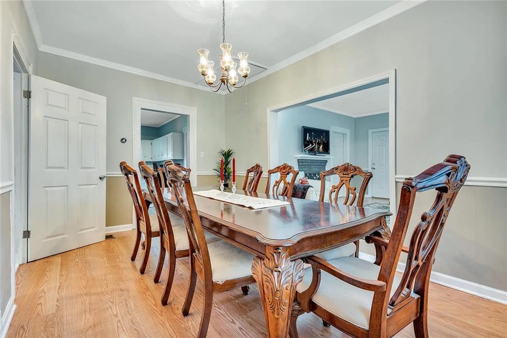 72 Kenyon Street Southeast, Unit 72 Atlanta, GA 30316 - Photo 5 of 10 a view of a dining room with furniture and chandelier