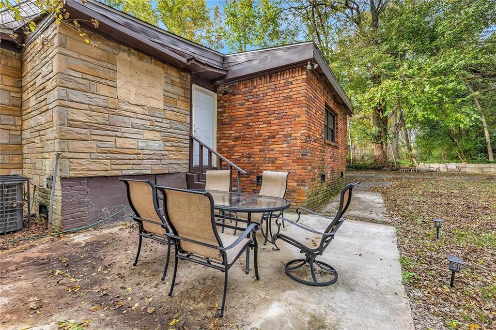 72 Kenyon Street Southeast, Unit 72 Atlanta, GA 30316 - Photo 10 of 10 a view of backyard with a patio and outdoor seating