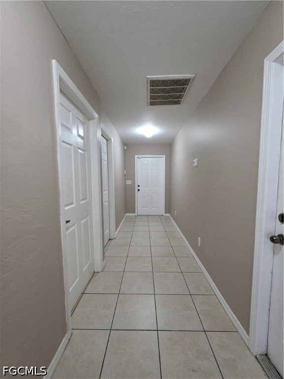4647 24th Street Southwest Lehigh Acres, FL 33973 - Photo 12 of 12 a view of a hallway