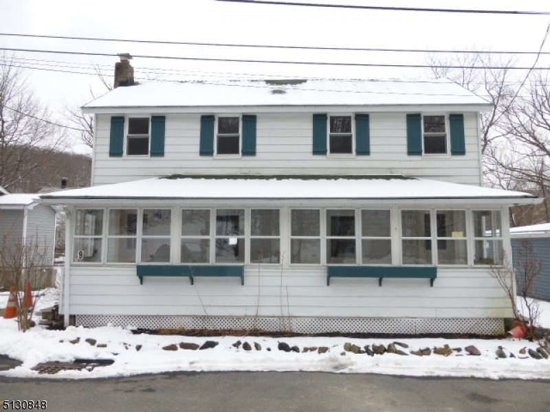 9 New Row Road, Unit A Hibernia, NJ 07842 - Photo 1 of 28 a front view of a house