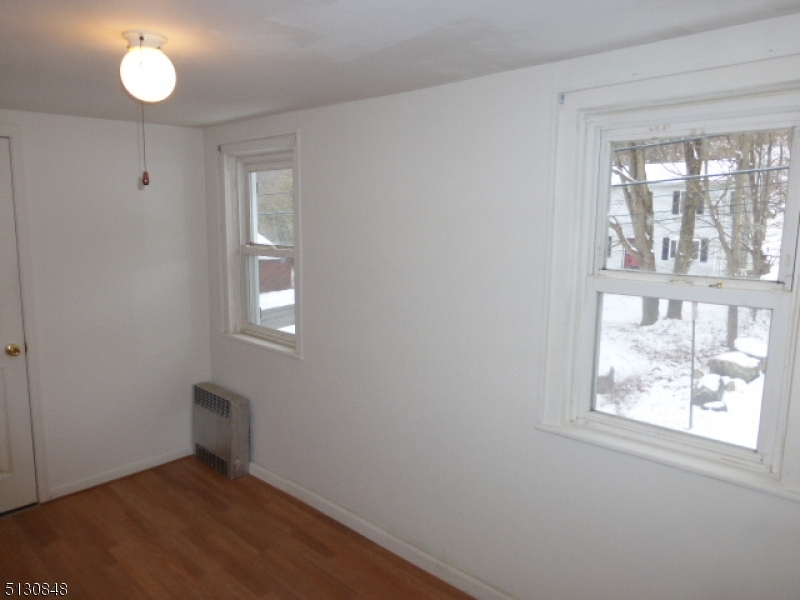 9 New Row Road, Unit A Hibernia, NJ 07842 - Photo 22 of 28 a view of an empty room with a window