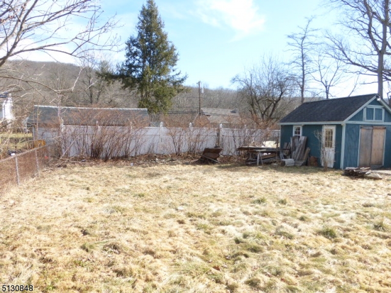 9 New Row Road, Unit A Hibernia, NJ 07842 - Photo 27 of 28 a front view of a house with a yard