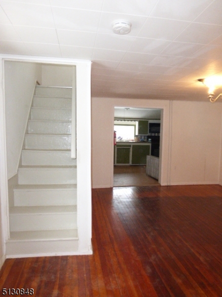 9 New Row Road, Unit A Hibernia, NJ 07842 - Photo 4 of 28 a view of a kitchen with furniture and wooden floor