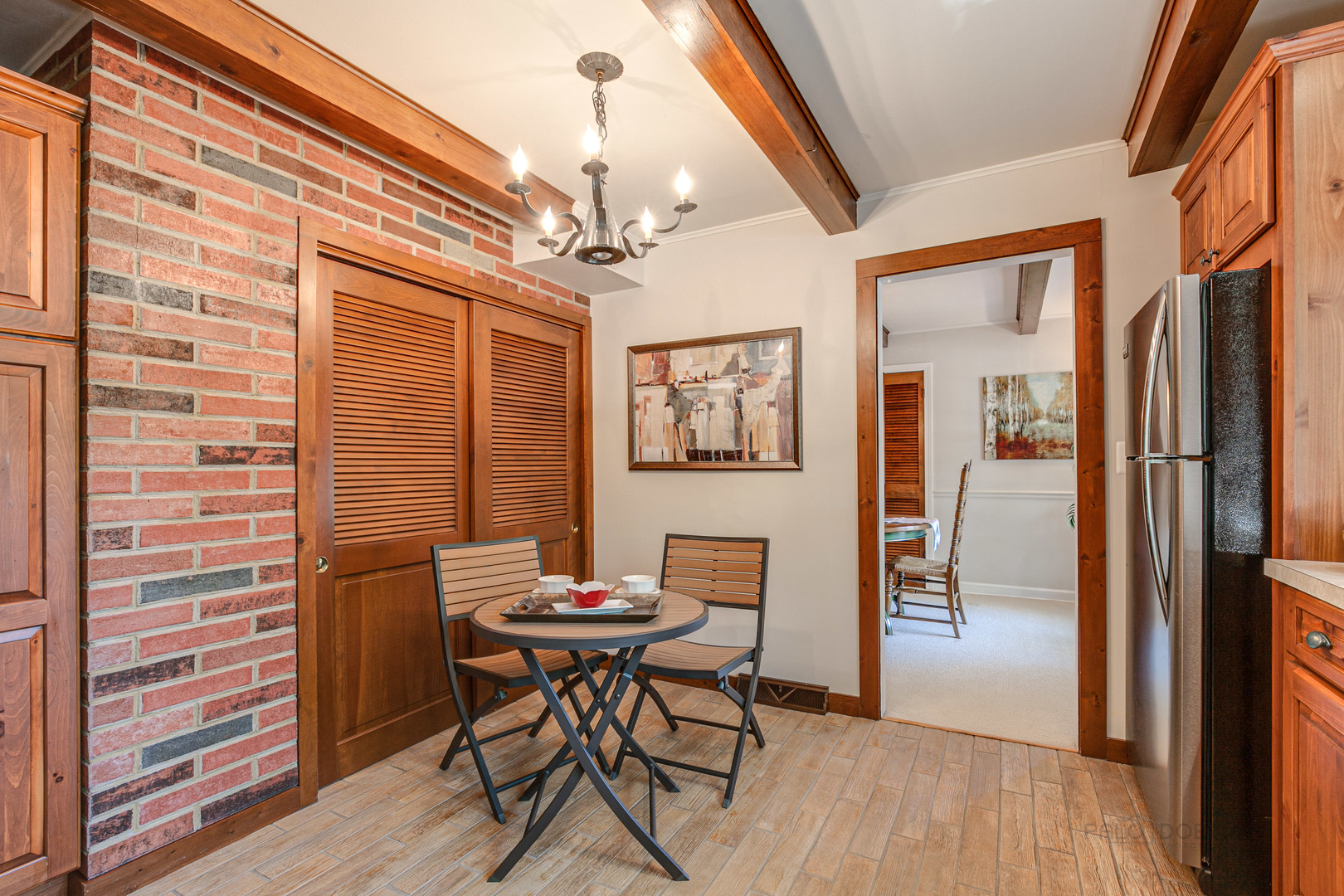 38 Golfview Road Lake Zurich, IL 60047 - Photo 12 of 27 a view of a dining room with furniture and wooden floor